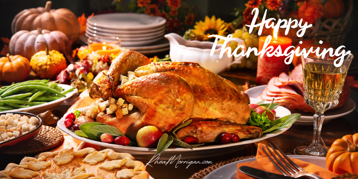 Photo of a Thanksgiving dinner with turkey, wine, green beans, pies and pumpkins